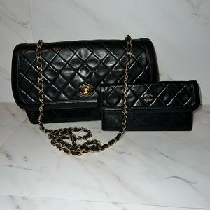 Chanel flap in black with wallet . Gold hardware.